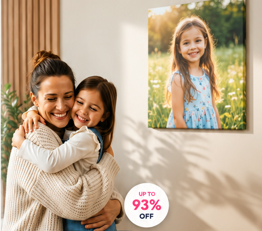Mother and daughter beside a custom canvas wall portrait